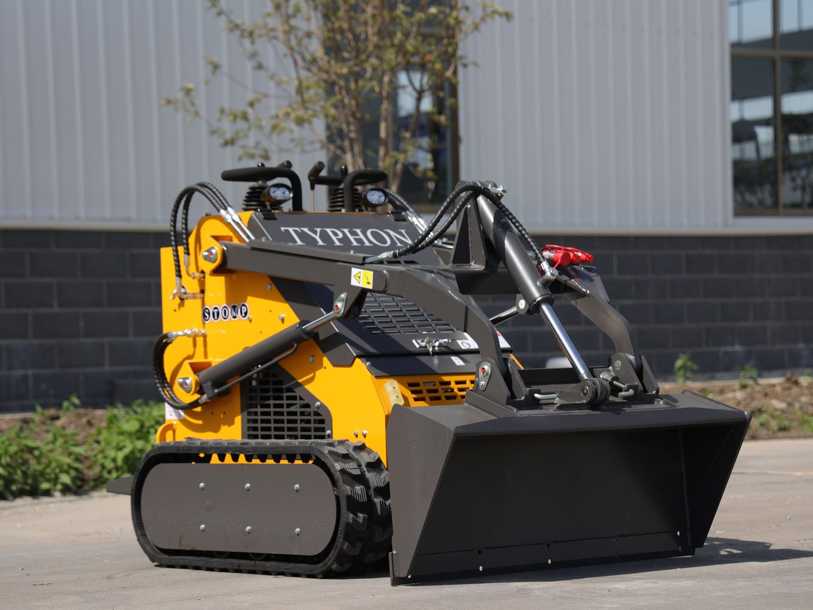 Top Compact & Mini Excavator Diggers- TYPHON Machinery Brand New TYPHON STOMP 2000lbs Mini Skid Steer Loader
